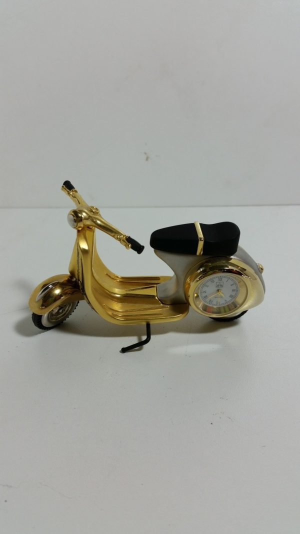 Reloj motocicleta de oro damasquino